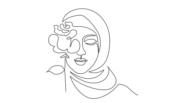 Young happy woman in hijab with flowers on her face