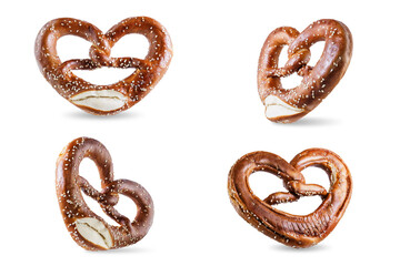 Pretzel with salt and sesame seeds on a white isolated background