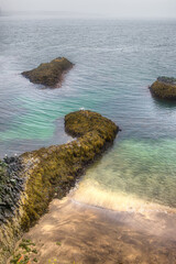 Obraz premium Iceland seascape with aqua water and small islands.