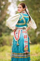 Beautiful young woman in slovak folk dress. Slovak folklore.