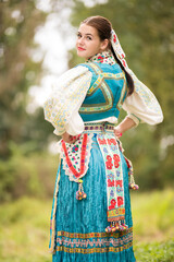 Beautiful young woman in slovak folk dress. Slovak folklore.