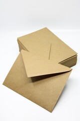 Brown standard sized envelope. It is made of ecological material. It is classical eco design of every day use product