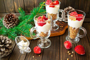 Strawberry smoothie with yoghurt, fresh strawberries on the dark background