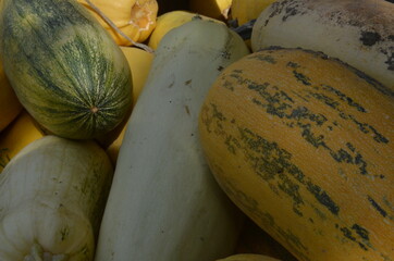 background of piled yellow zucchini