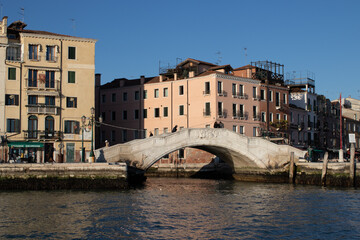 Fototapeta na wymiar Views across to a bridge alongside the Grand Canal 