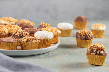 Brigadeiro is a common Brazilian dessert. Delicious chocolate candy Brigadeiro on a table