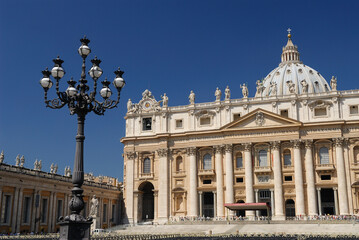 Fototapeta na wymiar Saint Peters Basilica in Rome with lampost