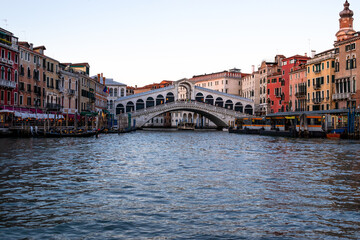 Heading towards the Rialto Bridge as the sun sets over the Grand Canal and Venice
