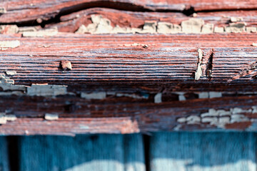 Peeling paint on an old wooden background. Wood texture. Grunge old background.