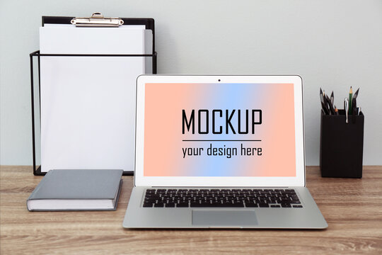 Modern Laptop With Text Mockup Your Design Here On Screen