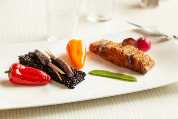 Salmon with black rice and vegetables