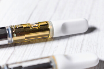 THC:CBD cannabis oil vape pen cartridge up close