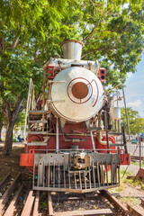 Havana, Cuba-October 08, 2016. Front view of the old steam train locomotive, used on Cuba's sugar plantations at the Park de los Agrimensores on October 08, 2016 in old Havana city of Cuba.