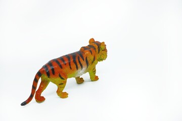 Tiger rubber toys, Isolated on white background. Rubber animals toys for kids. Wild animals. 