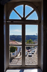 Semicircular window with view of Diamantina city, Minas Gerais, Brazil