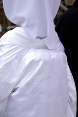 綿帽子と白無垢の花嫁姿