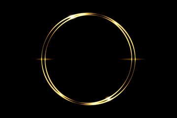 Glowing gold circle ring with light effect on black backdrop, abstract background