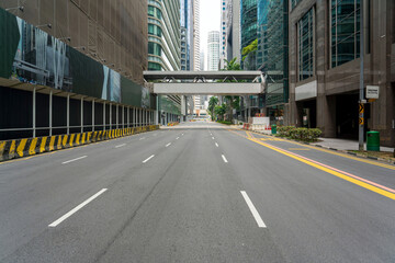 Quiet Singapore street with less pedestrians and cars during the pandemic of Coronavirus disease (COVID-19).