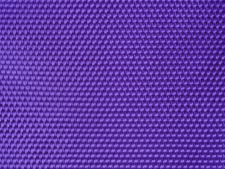 abstract purple fabric texture blur background with closeup surface and fiber of silk for wallpaper and pattern design