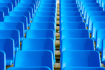 Obraz premium geometric photo of a set of blue seats on a street grandstand for watching sports
