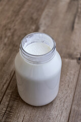 Natural White Yogurt in a Jar. Healthy Diet. Copy Space