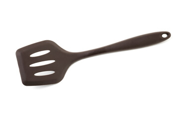 Silicone frying pan spoon isolated on a white background.