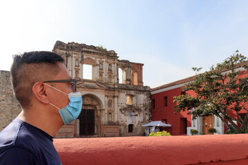 Man walking with face mask in antigua guatemala