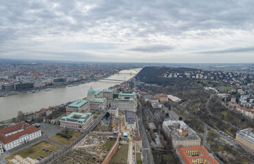 Aerial drone shot of Buda Castle on the hill in Budapest winter morning