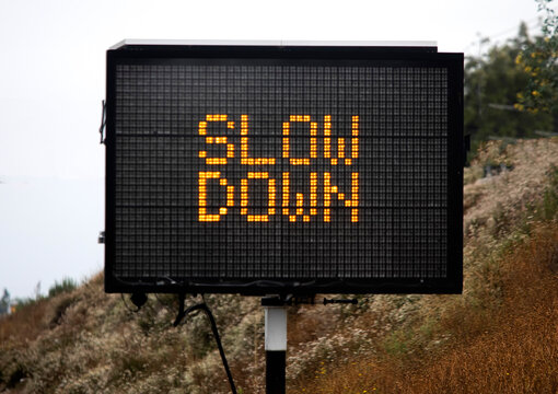 Road Sign Stating Slow Down