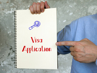Business concept about Visa Application with phrase on the page.