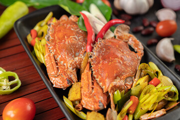 Stir-fried crab with curry powder in a plate.