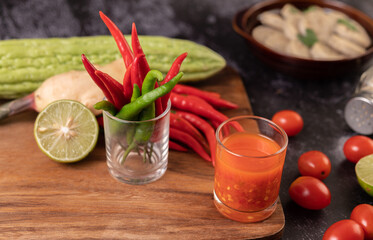 The ingredients used for the salad include tomatoes, peppers, lime and bitter gourd.