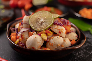 Spicy Meatball Salad with Chili, Lemon, Garlic and Tomato.
