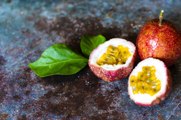 Selective focus group of fresh Tropical Passion Fruits on grunge background , Ripe passion fruit so...