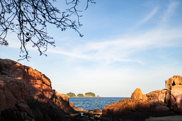 A tropical island with Cliffs and perfect bly sky at Long Beach Redang Islands, Malaysia