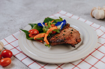 Pork Steak with Tomato, Carrot, Red Onion, Peppermint, Butterfly Pea Flower, and Lime.