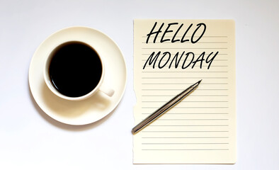 HELLO MONDAY - white paper with pen and coffee on wooden background