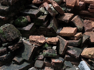 pile broken old brick of ruined temple in Thailand