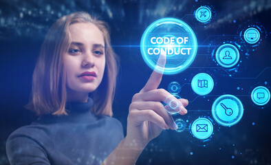 Business, Technology, Internet and network concept. Young businessman working on a virtual screen of the future and sees the inscription: Code of conduct