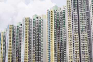 Residential area in old apartment with windows. High-rise building, skyscraper with windows of...