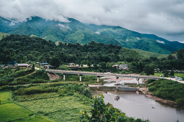 Naklejka premium Greenery view of Sapan village a small village nestled in a forested northern valley of pure air and pristine rivers in Nan province of Thailand.