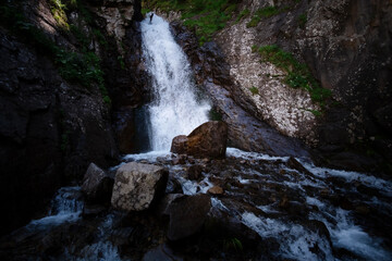 great full-blown Waterfall Shumka, Dombai, Karachay-Cherkessia, Russia