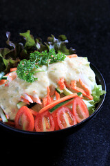 Dish of Salad with tomatoes, green and onion