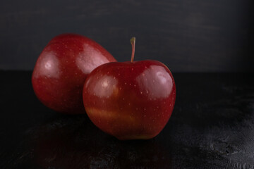 Fototapeta na wymiar Two red ripe apples