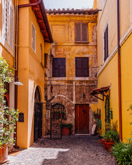 Fototapeta na wymiar Rome Italy, Trastevere old neighborhood picturesque street view