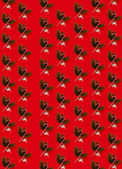 Christmas pattern. Repetition of a spruce branch, Santa's cane and a silhouette of an angel on a red background. Vertical. Merry Christmas and New Year concept.