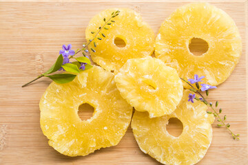  pineapple drying dessert snack tasty arrangement flat lay style on background  wooden 