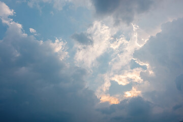 Fototapeta na wymiar Dramatic cloudy sky with sunset background 