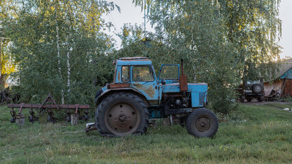 old tractor in village 2