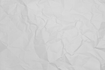 White crumpled paper texture background.